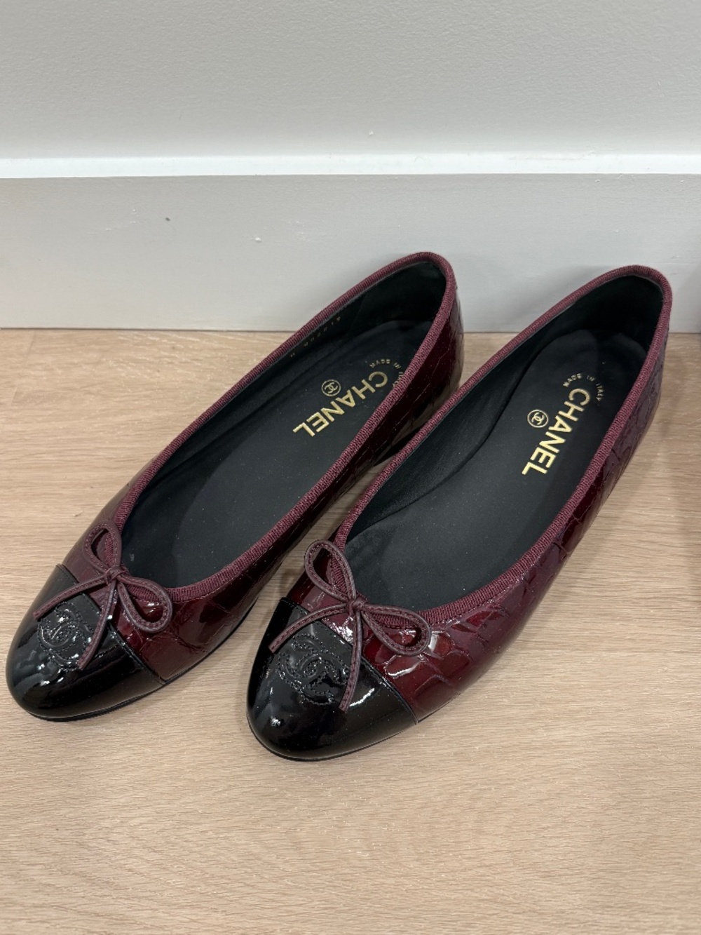 Authentic Chanel ballet flats in dark burgundy crocodile-embossed patent leather
